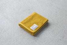 画像をギャラリービューアに読み込む, ワッフルみたいなパイルのやわらかいフェイスタオル|マスタード